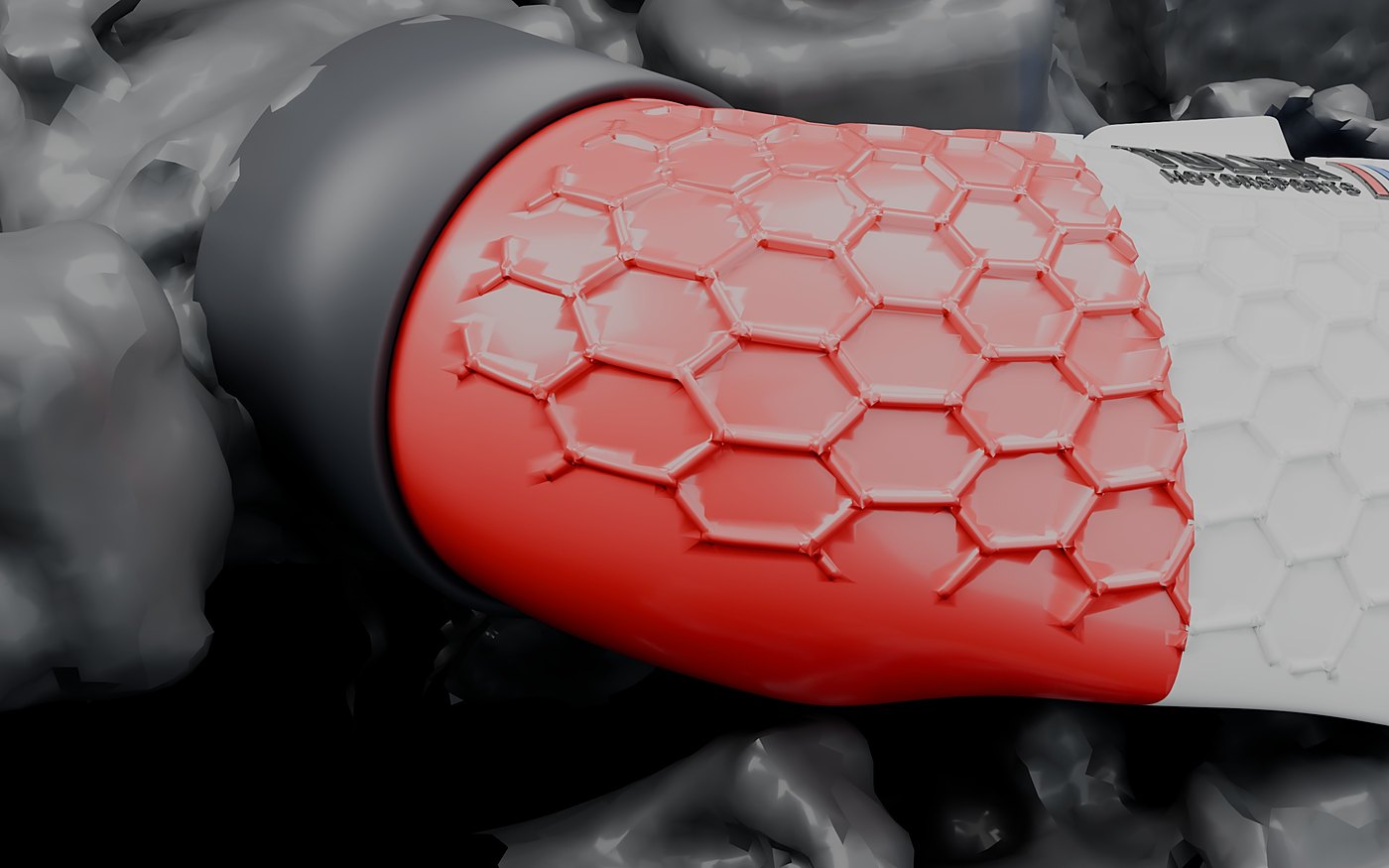 Red elbow section with the hex surface running into the black throttle body coupler