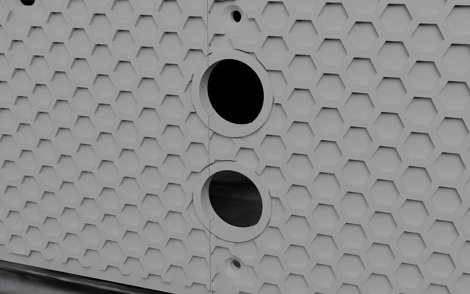 Two loom holes split on the lap joint between the plate halves